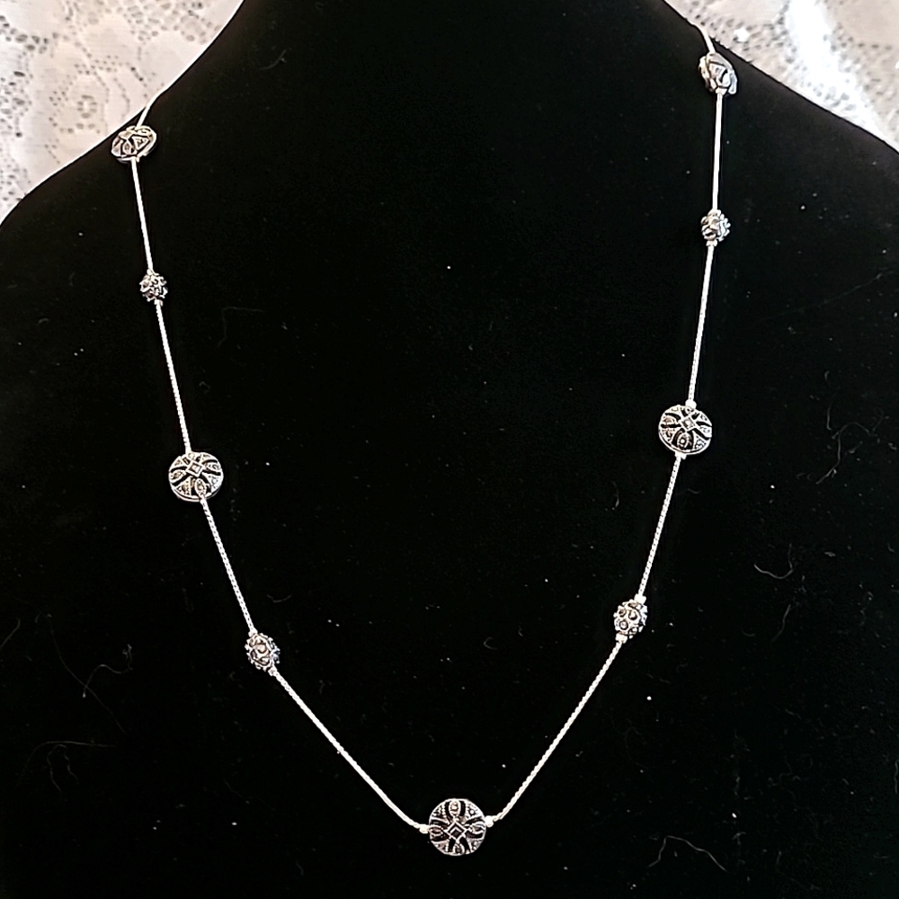 26" Trifari Silver & Black rondelle crystals with matching hoop earrings.